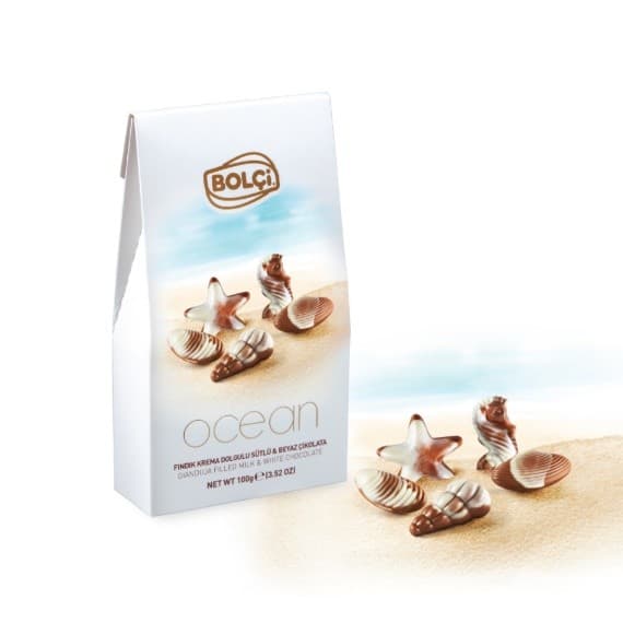GIANDUJA DOLGULU SÜT VE BEYAZ ÇİKOLATALI OCEAN KUTU 100 g